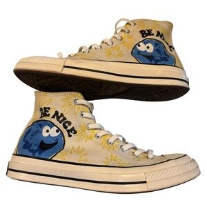 Converse women’s Blue Chuck 70 High Tops Sunny floral Be Nice.